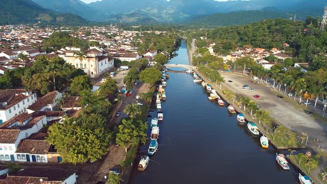 Urban view of Paraty city, Rio de Janeiro, Brazil. Lake with boats scene. Urban view of Paraty city, Rio de Janeiro, Brazil. Lake with boats scene. Urban view of Paraty. Lake with boats scene.