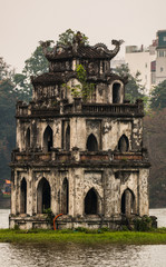 Fototapeta premium Turtle Tower in the center of Hoan Kiem Lake (Lake of the Returned Sword)