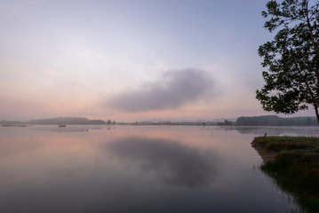 Obraz premium Morning nature scene, sky, clouds and fog (mist) on the lake