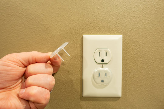 Electrical outlet with baby proof covers
