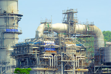 Fototapeta na wymiar Oil gas refinery plant. May called petroleum, production or petrochemical plant. Industrial factory construction from engineering technology with steel pipe, pipeline, tank. Business for power energy.