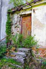Old abandoned building, unsuitable housing for life, devastation.