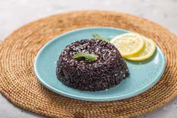 Delicious cooked black rice or risotto. Healthy food concept. top view