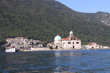 Fototapeta na wymiar Our Lady of the Rocks island and church in Boka Kotorska, Perast, Montenegro