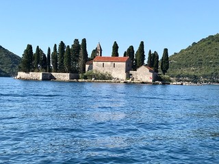 Island of St. George, one of two islet landmarks on Kotor Bay in Perast, Montenegro - 325941138