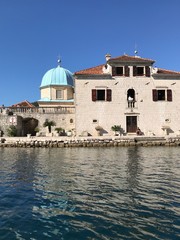 Our Lady of the Rocks island and church  in Boka Kotorska, Perast, Montenegro - 325941334