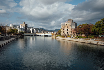 Fototapeta na wymiar Atomic bomb ruins with view Riverside in Hiroshima Japan