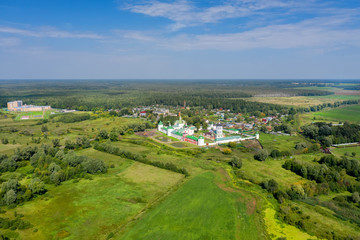 Aerial view over the surroundings Nikolo-Peshnoshsky Monastery on a summer day