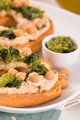 Friselle with turnip tops and hummus.