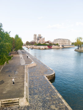 Paris, Quai de seine Jussieu, 5th arrondissement, France. Beautiful daylight shot. Notre-Dame de Paris construction site in the background (a few months after the fire).