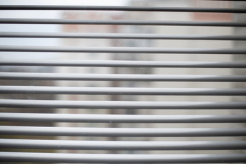 Obraz premium jalousie at windows close up