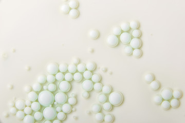 Abstract blurred background with colorful gradient colors. Oil drops in water abstract psychedelic image pattern.