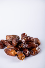 Eastern dates isolated on white backdrop