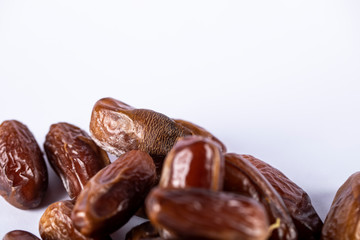 Oriental dates on white backdrop. 