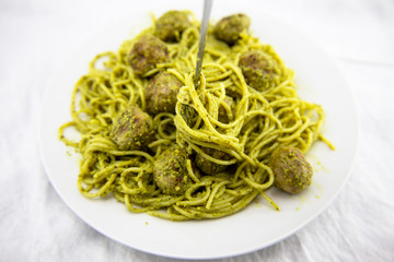 meatballs with pasta and pesto sauce