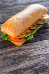 sandwich with salmon and vegetables