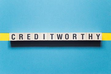 Creditworthy word concept on cubes