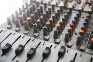 Obraz premium Buttons equipment for sound mixer control. Music Studio