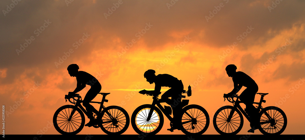 Sticker Silhouette  Cycling  on blurry sunrise  sky   background.