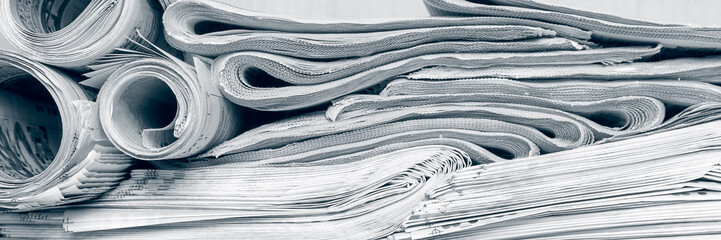 News concept. Panoramic image of old media newspapers