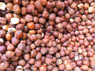 Close-Up Of Peeled Hazelnuts. Healthy Fresh Food Background.