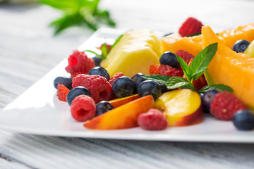 fresh fruit salad with fruits and berries