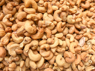 Close-Up Of Cashew Nuts Peeled. Healthy Fresh Food Background.