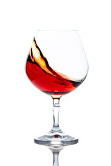 Snifter of brandy  isolated on white background.
