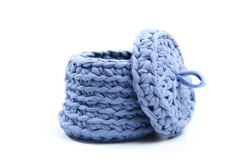 blue woven fabric basket isolated on white background.