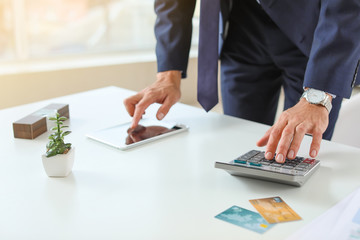 Male bank manager working in office