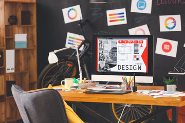 Comfortable workplace of interior designer in office