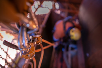 Top view of rope access anchor point rigging with two locking Karabiner, descenders clipping into...
