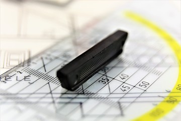 calculator and pen on background