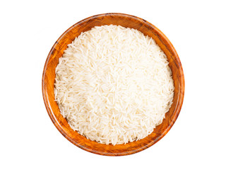Indian long grain Basmati rice in bamboo bowl isolated on white. Indian cuisine, ayurveda, naturopathy concept