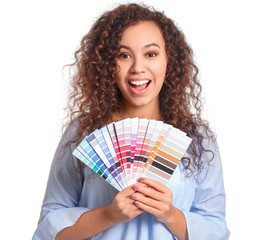 African-American woman with color palettes on white background