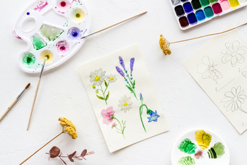 Watercolor painting. Picture with flowers, paints, palette on white background top-down