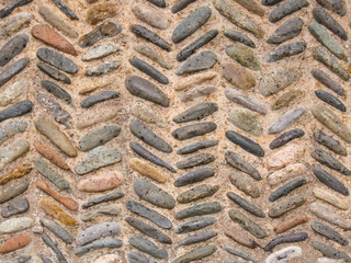 Cobblestone pattern with herringbone ornament closeup