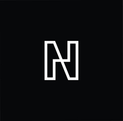 Minimal elegant monogram art logo. Outstanding professional trendy awesome artistic N NN NH HN initial based Alphabet icon logo. Premium Business logo in White color on black background