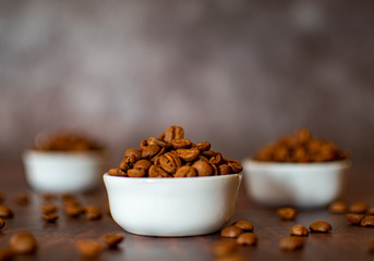 Coffe beans macro shoot on wooden tabletop