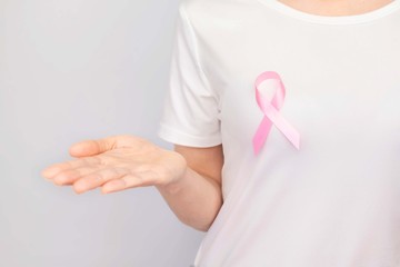 World Breast Cancer Day Concept,health care - woman wore pink t-shirt,Pink ribbon for breast cancer...