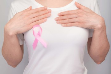 World Breast Cancer Day Concept,health care - woman wore pink t-shirt,Pink ribbon for breast cancer...