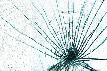 Shattered glass window against a white background