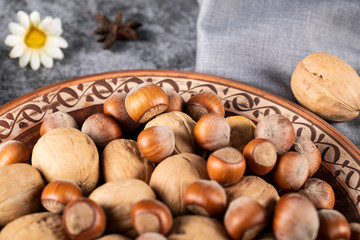 Nuts and walnuts in a decorative platter