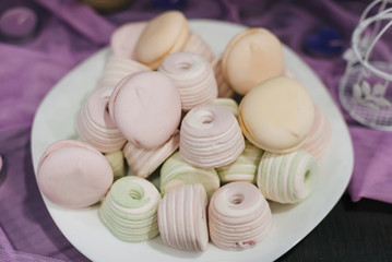 colorful marshmallows and macaroons on a plate