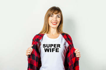 Super wife text has been added to the shirt. Concept for text, logo, shock, surprise. Banner