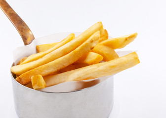 French Fries in silver bucket on background