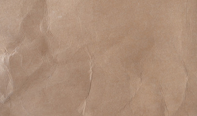 Brown crumpled paper texture background.