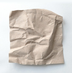 Obraz premium Brown wrinkle recycle paper background. Crumpled brown paper on white background.
