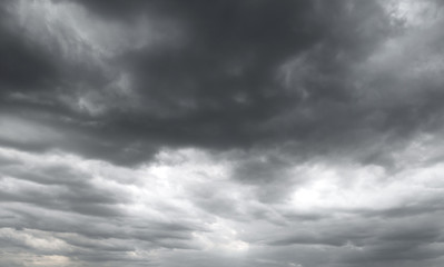 Obraz premium Dark storm clouds before rain used for climate background. Clouds become dark gray before raining.