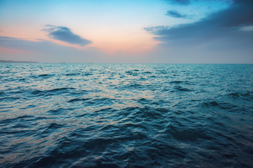 Sea ripple water and sunset over the sea
